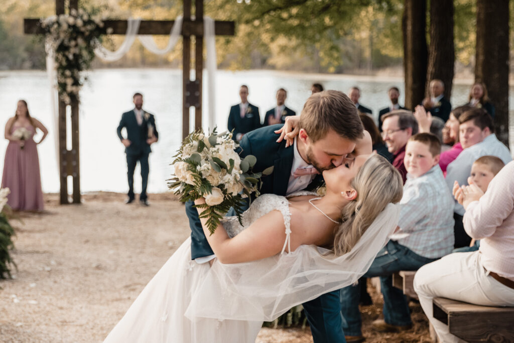 Bride & Groom kiss at Rasberry Greene 